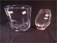 Two Swedish oval crystal vases: one etched