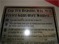 TIN 'GUNS OVER WOMEN' SIGN