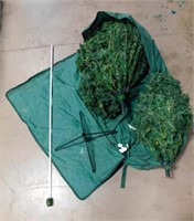 large Christmas tree in green bag