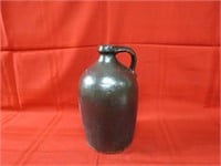 Antique stoneware brown glaze jug.