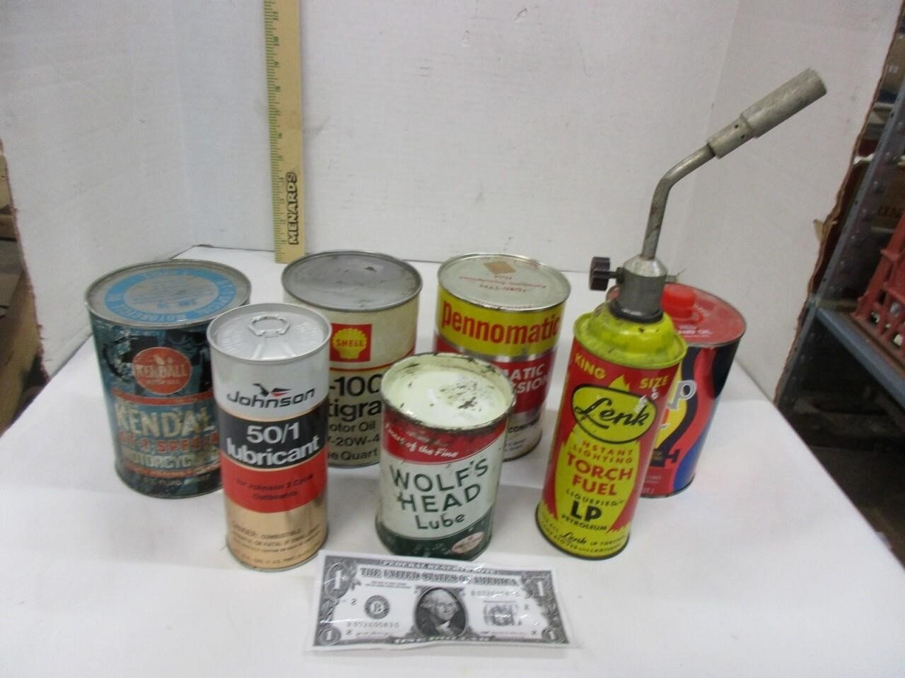 Vintage full oil cans and more