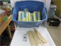 Large group of paint rollers and paint sticks