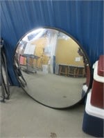 Large round mirror, approximately 3 feet diameter