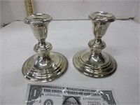 Two sterling weighted candleholders