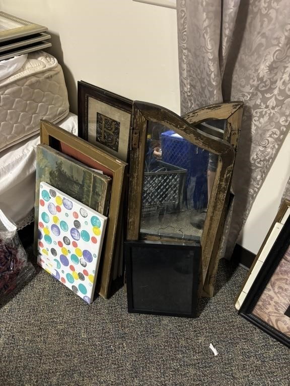 lot of wall decor, picture frames prints etc.