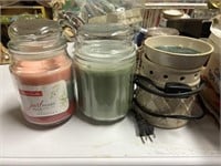2 jar candles new and 1 candle warmer