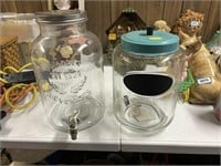 10,5: tall storage jar and 13" tall drink dispensr