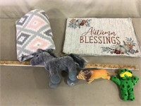 Placemats, blanket, stuffed animals