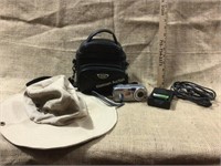 Safari hat and Sony camera with case
