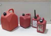 Four Assorted Size Gas Cans As Shown