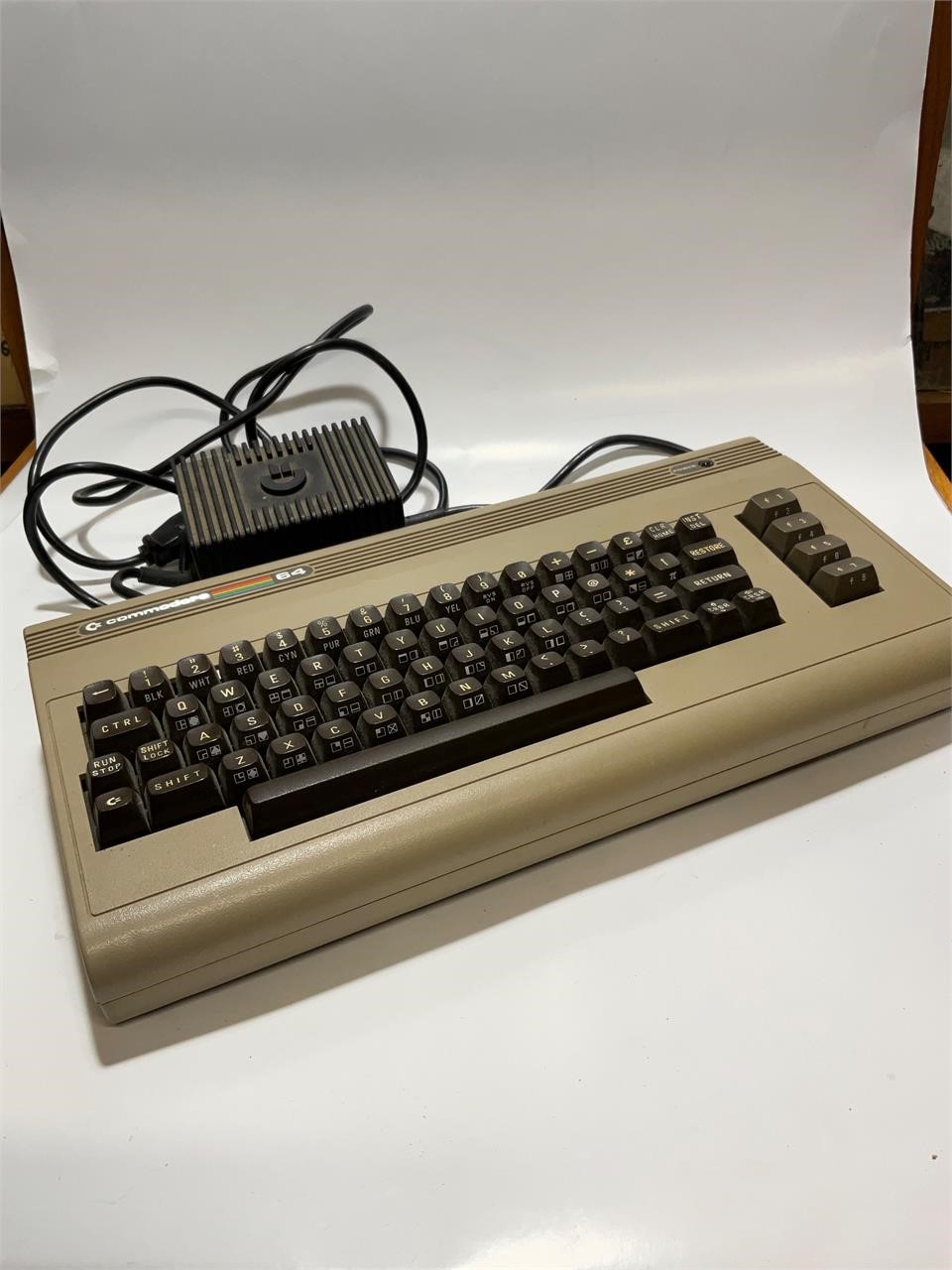 Commodore 64 computer keyboard with plug