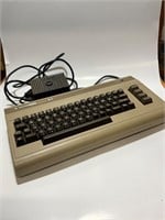 Commodore 64 computer keyboard with plug