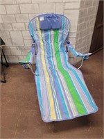 Folding lawn chair with foot rest