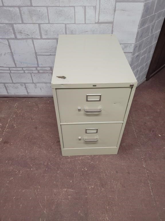 Metal file cabinet with keys