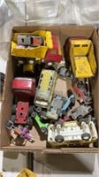 Metal, toy trucks, and cars