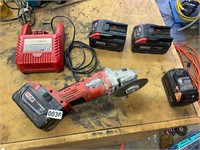 Milwaukee 4 1/2 “angle grinder, batteries, charger