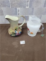 2 Vintage juice pitchers