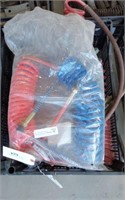 2 NEW COILED AIR LINE HOSES AND A COUPLE SETS