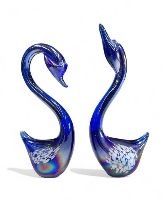 Pair of blue art glass swans 
8 1/2” h.