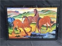 Lucite-framed print of wild horses