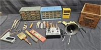Large group of items with tools, organizing