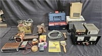 Large group of meters, battery charger, vise,