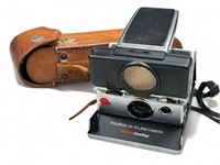 Vintage Polaroid SX-70 Land camera with leather
