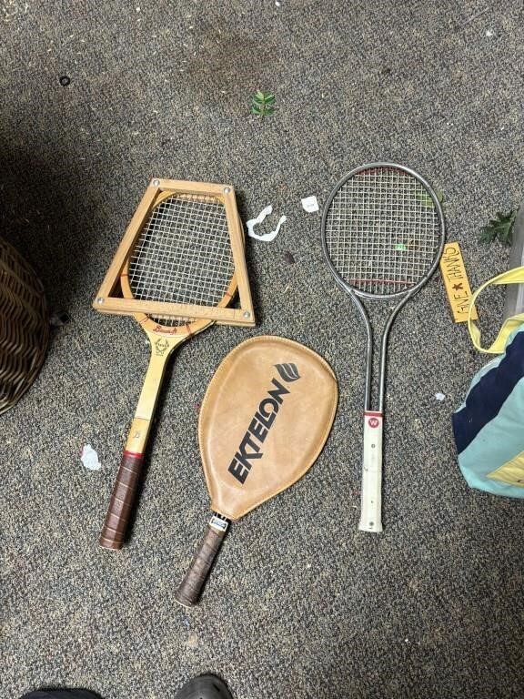 2 tennis rackets and 1 pickle ball racket some wih