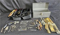 Group of two metal tool boxes with lots of