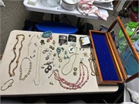wood jewelry box, of costume jewelry, rings,