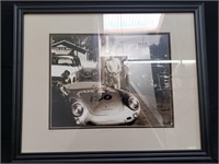 Signed and numbered photograph in frame