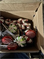 box of christmas ornaments, candy canes, bulbs