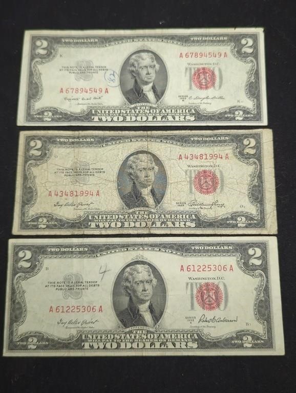 Three 1953 $2 Red Seal US paper money bills