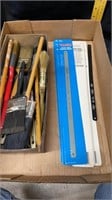 hacksaw blades and paint brushes
