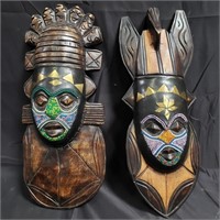 Pair of carved wood beaded African masks