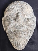 Lava rock face sculpture