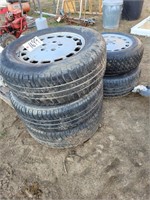 5- P215/65 R15 TIRES W/ ALUM. RIMS