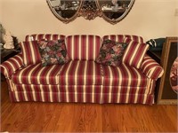 Red & Cream striped couch (one cushion has stain)