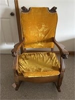 Antique Rocker with carved lions heads