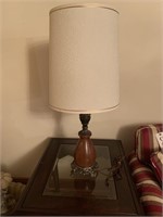 Wood and brass lamp with ornate base
