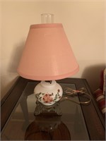 Milk glass lamp with pink shade and rose design