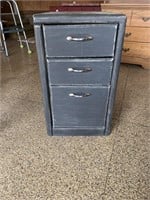 Filing cabinet painted black