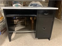 Black desk with gray laminate top