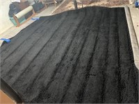 Solid black rug 12' x 15 1/2'