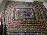Wood quilt measuring 87" x 96"