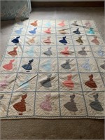 Dutch girl quilt, cream and pastel, has a few