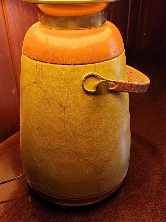 MCM leather wrapped lamp.  Look at the photos for