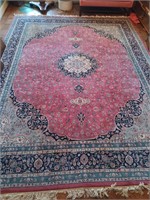 Nice wool rug with fringe.   11' 10" x 9' 2"