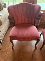 Side chair with tuffeted back, wood legs & edging