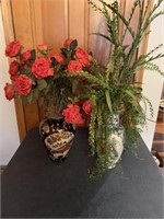 2 urns with floral arrangements